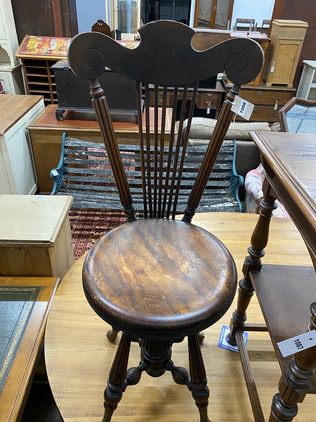 A 19th century French walnut harpist chair, with bronze feet